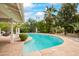 Inviting kidney shaped pool with flagstone patio and lush landscaping at 5741 N 38Th Pl, Paradise Valley, AZ 85253