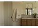 Bathroom with modern vanity and large mirror at 5942 E Sage Dr, Paradise Valley, AZ 85253