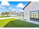 Spacious backyard with a refreshing pool and grassy area at 6040 E Lafayette Blvd, Scottsdale, AZ 85251