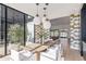 Sunlit dining room with view of backyard and pool at 6040 E Lafayette Blvd, Scottsdale, AZ 85251