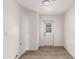 Laundry room with wood-look floors and exterior access at 6801 S Palm Dr, Tempe, AZ 85283