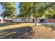 House exterior showcasing a large front yard at 700 W Northern Ave, Phoenix, AZ 85021