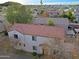 Aerial view of a two-story home with tile roof in a residential neighborhood at 7519 S 13Th Pl, Phoenix, AZ 85042