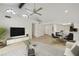 Bright living room with hardwood floors and modern furniture at 9084 E Winchcomb Dr, Scottsdale, AZ 85260