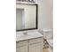 Bathroom features a vanity with mirror and toilet at 10221 E Knowles Ave, Mesa, AZ 85209