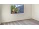 Simple bedroom with neutral color palette and carpet flooring at 10221 E Knowles Ave, Mesa, AZ 85209