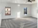 Spacious bedroom with carpet, ceiling fan and large windows at 10221 E Knowles Ave, Mesa, AZ 85209