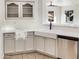 White kitchen with sink, dishwasher, and ample cabinetry at 10221 E Knowles Ave, Mesa, AZ 85209