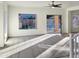 Spacious living room featuring sunlight and backyard access at 10221 E Knowles Ave, Mesa, AZ 85209