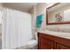 Clean bathroom with a shower/tub combination and granite vanity at 11062 W Coggins Dr, Sun City, AZ 85351