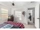 Bedroom with sliding door closet and ceiling fan at 11311 E Upton Ave, Mesa, AZ 85212