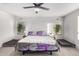 Spacious bedroom with ceiling fan and large windows at 11311 E Upton Ave, Mesa, AZ 85212