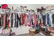Large walk-in closet with ample hanging space and shelving at 11311 E Upton Ave, Mesa, AZ 85212