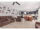 Open concept dining area with a wooden table and chairs, adjacent to the kitchen at 11311 E Upton Ave, Mesa, AZ 85212