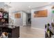 Bright hallway with wood-look floors and access to rooms at 11311 E Upton Ave, Mesa, AZ 85212