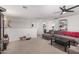 Spacious living room with sectional sofa and large TV at 11311 E Upton Ave, Mesa, AZ 85212
