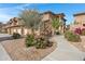 Attractive 2 story stucco building with walkway and landscaping at 11500 E Cochise Dr # 1099, Scottsdale, AZ 85259