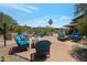 Community patio with comfortable seating and fire pit at 11500 E Cochise Dr # 1099, Scottsdale, AZ 85259