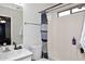 Bathroom features a shower/tub combo and a vanity at 15721 W Lundberg St, Surprise, AZ 85374