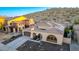 Aerial view of a single-story home with solar panels and desert landscaping at 18133 W Las Cruces Dr, Goodyear, AZ 85338