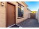 Private backyard access with a gate and gravel at 18133 W Las Cruces Dr, Goodyear, AZ 85338