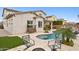 Stunning backyard oasis with a sparkling pool at 18407 W Fulton St, Goodyear, AZ 85338