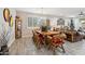 Rustic dining area with a large wooden table and comfortable log chairs at 18407 W Fulton St, Goodyear, AZ 85338