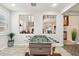 Game room with foosball table and view into the home's interior at 18407 W Fulton St, Goodyear, AZ 85338