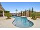 Relaxing pool area with a water slide, landscaping, and plenty of sunshine at 18407 W Fulton St, Goodyear, AZ 85338