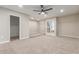 Bright bedroom with carpeted floor and ceiling fan at 1927 E Duke Dr, Tempe, AZ 85283