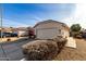 House exterior with a two-car garage and driveway at 3415 E Escuda Rd, Phoenix, AZ 85050