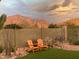 Serene backyard with mountain views and comfortable seating at 4091 S Hackberry Trl, Gold Canyon, AZ 85118