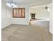 Dining area with view of living room and fireplace at 5221 W Sandra Ter, Glendale, AZ 85306