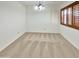 Empty dining room with hardwood floors and large windows at 5221 W Sandra Ter, Glendale, AZ 85306