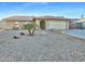 Single-story home with attractive landscaping at 5221 W Sandra Ter, Glendale, AZ 85306