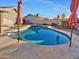 Refreshing kidney-shaped pool in backyard oasis at 5221 W Sandra Ter, Glendale, AZ 85306