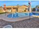 Relaxing kidney-shaped pool with patio and umbrellas at 5221 W Sandra Ter, Glendale, AZ 85306