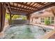 Hot tub under pergola with bubbling water at 5630 W Kesler St, Chandler, AZ 85226