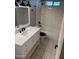 Clean bathroom with white fixtures and a bathtub at 6607 S Mitchell Dr, Tempe, AZ 85283