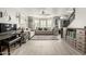 Bright and airy living room with a bay window and built in shelving at 6746 W Tonto Dr, Glendale, AZ 85308