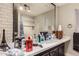 Bathroom with vanity, shower, and large mirror at 6828 W Pierce St # 126, Phoenix, AZ 85043