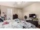 Bedroom with dresser and flat screen TV at 6828 W Pierce St # 126, Phoenix, AZ 85043