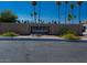Community entrance with signage for San Estrella Estates at 6828 W Pierce St # 126, Phoenix, AZ 85043