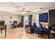 Living room with hardwood floors and home office at 6828 W Pierce St # 126, Phoenix, AZ 85043