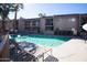 Refreshing community pool with lounge chairs for relaxing at 7436 E Chaparral Rd # B213, Scottsdale, AZ 85250