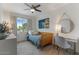 Cozy bedroom with daybed, desk, and window at 7925 E Keim Dr, Scottsdale, AZ 85250