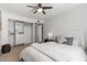 Spacious bedroom with a queen bed, large closet, and window at 7925 E Keim Dr, Scottsdale, AZ 85250