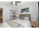Cozy bedroom with a queen bed, built-in closet, and bedside table at 7925 E Keim Dr, Scottsdale, AZ 85250