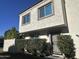 Two-story stucco home with a gated entry and landscaping at 7925 E Keim Dr, Scottsdale, AZ 85250