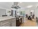 Modern kitchen with island, stainless steel appliances, and hardwood floors at 7925 E Keim Dr, Scottsdale, AZ 85250
